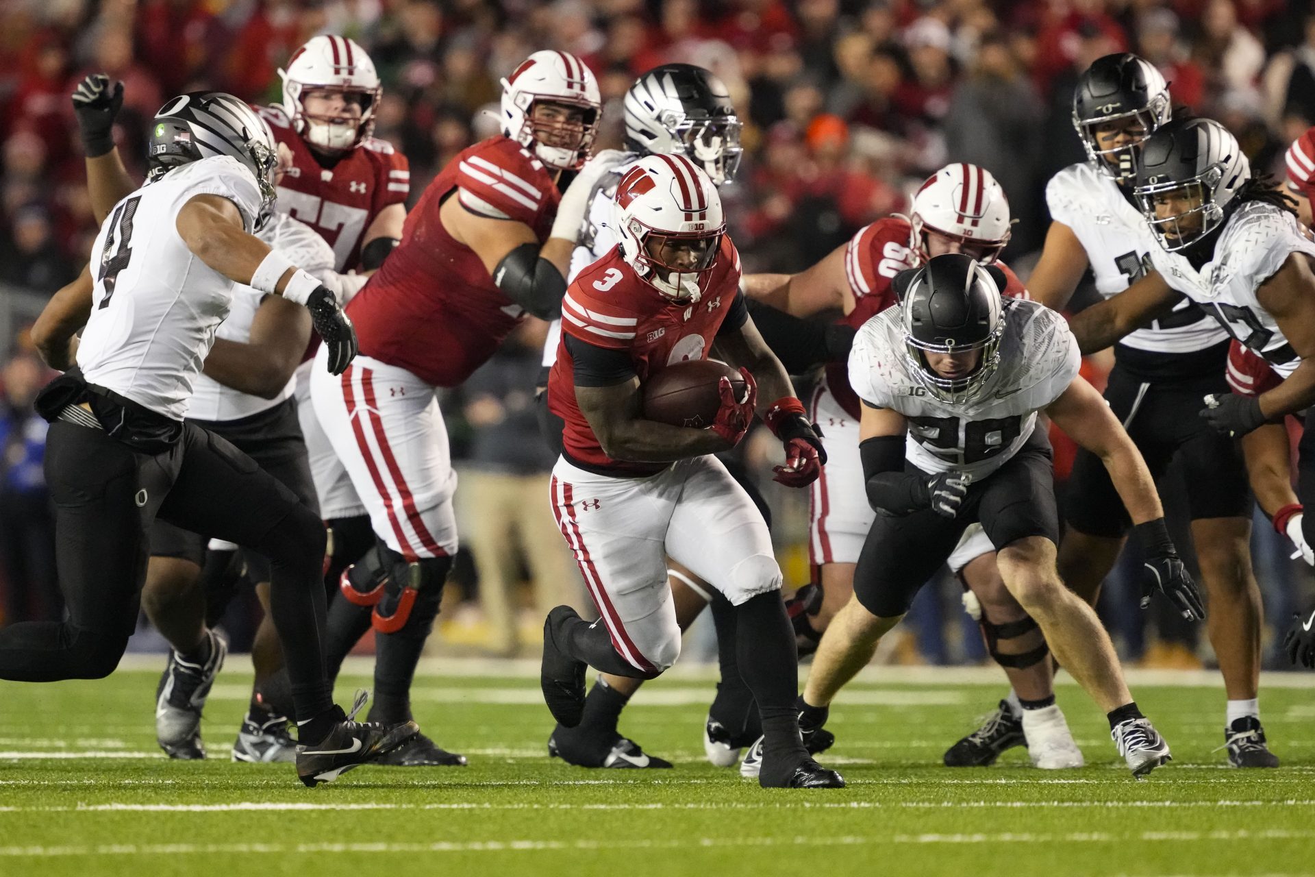 Wisconsin Badgers running back Tawee Walker (3) rushes with the football during the third quarter against the Oregon Ducks at Camp Randall Stadium.