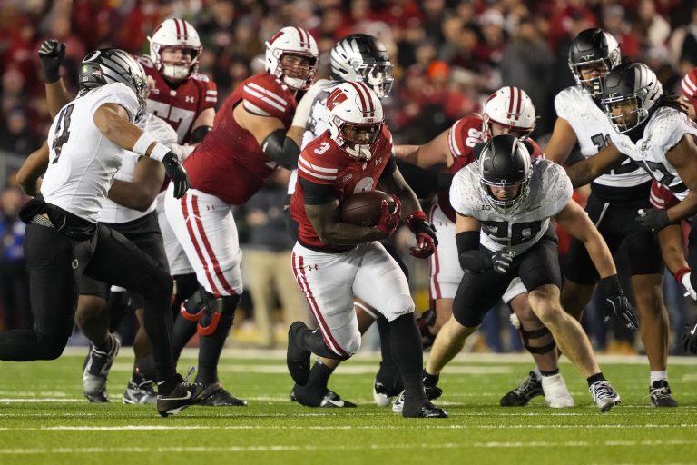 Wisconsin Badgers running back Tawee Walker (3) rushes with the football during the third quarter against the Oregon Ducks at Camp Randall Stadium.