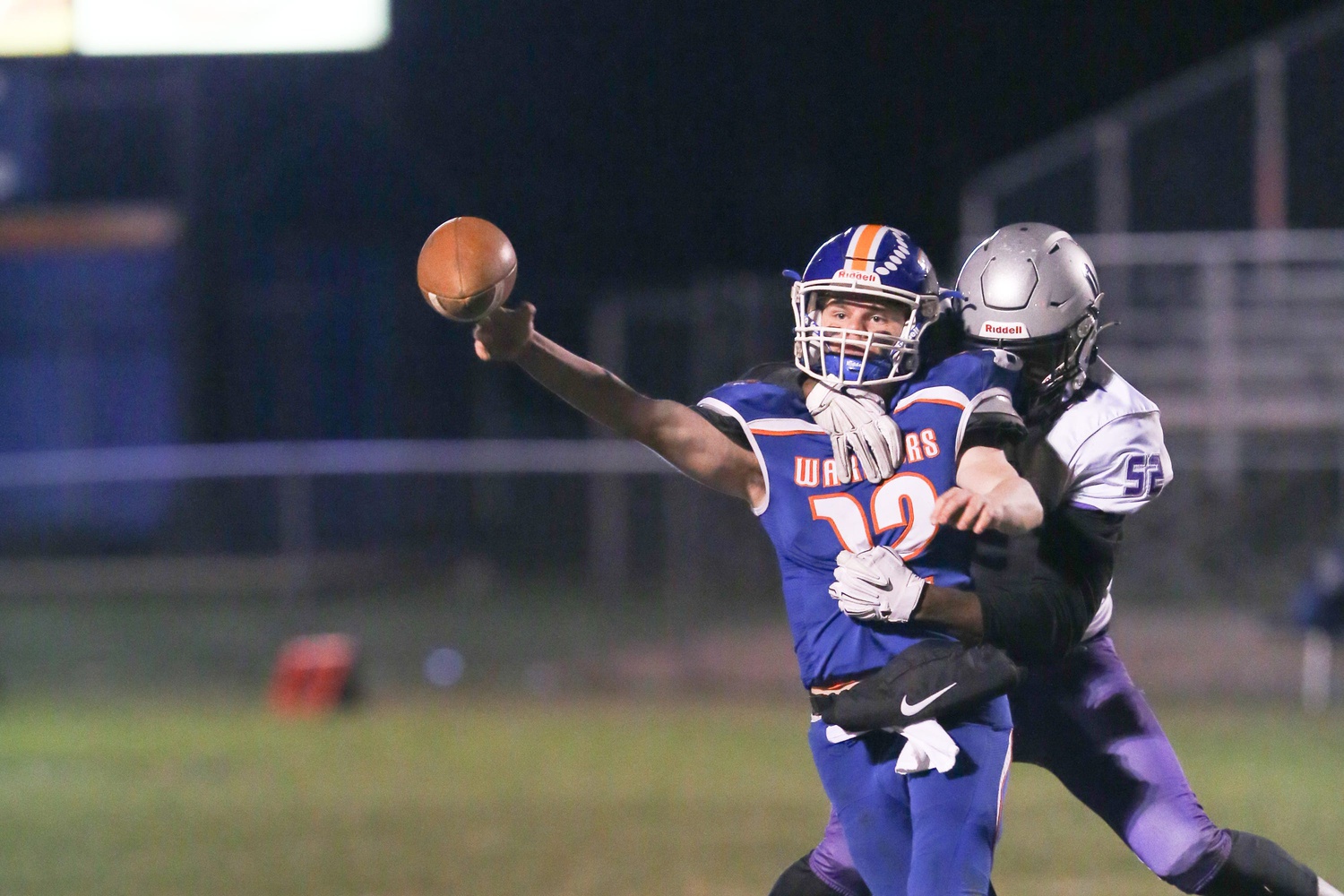Joppatowne's Zion Elee wraps up Boonsboro QB Colin Telemeco as he releases the ball.