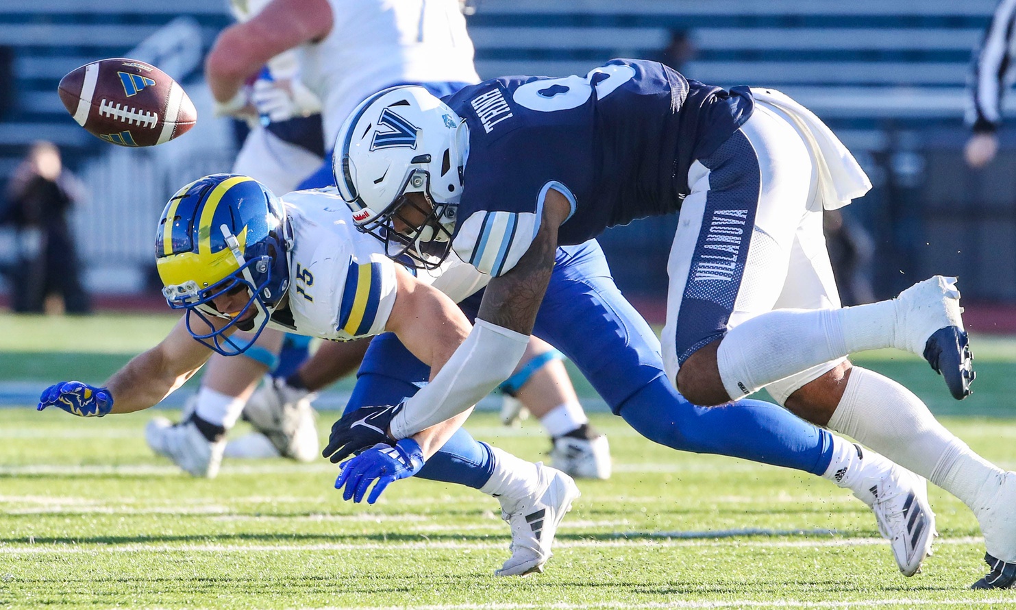 Delaware receiver Jake Thaw can't come up with a catch against Villanova's Ty Trinh in the third quarter of the Blue Hens' 38-28 loss at Villanova Stadium, Saturday, Nov. 23, 2024.