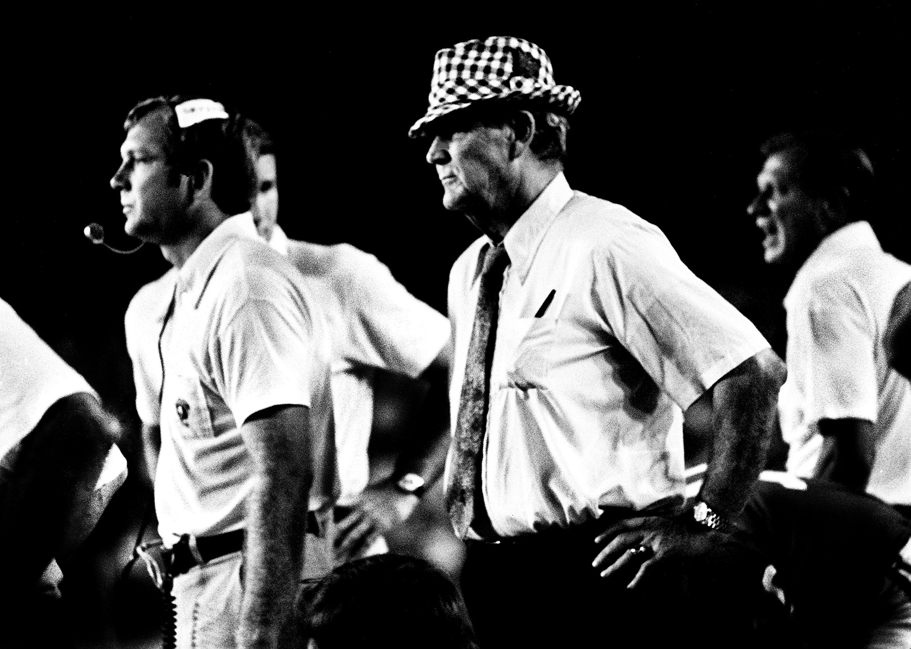 Alabama coach Bear Bryant, center, surveys the scene as he went to second and third team players early against Vanderbilt on Sept. 29, 1973. © Joe Rudis / The Tennessean / USA TODAY NETWORK