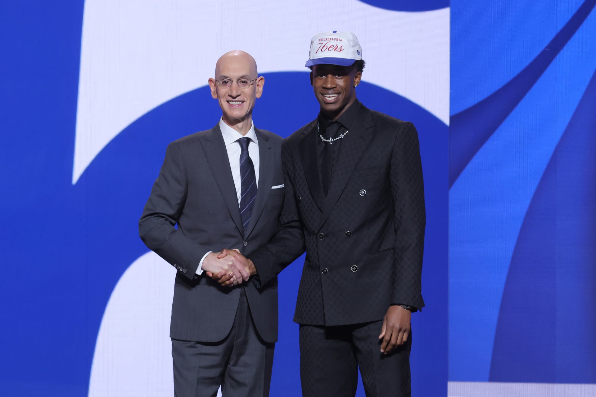 VJ Edgecombe stands with NBA commissioner Adam Silver after being selected as the third pick by the Philadelphia 76ers in the first round of the 2025 NBA Draft at Barclays Center.