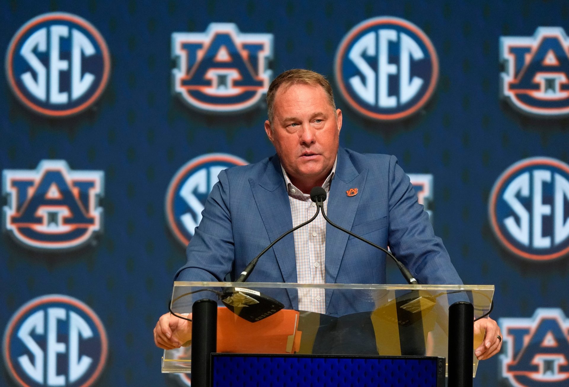 Auburn head coach Hugh Freeze speaks in the Main Media Room during SEC Media Days at the College Football Hall of Fame in Atlanta.