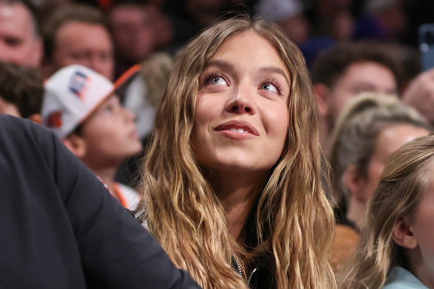 Actress Sydney Sweeney sits courtside during the game between the New York Knicks and the Brooklyn Nets at Barclays Center.