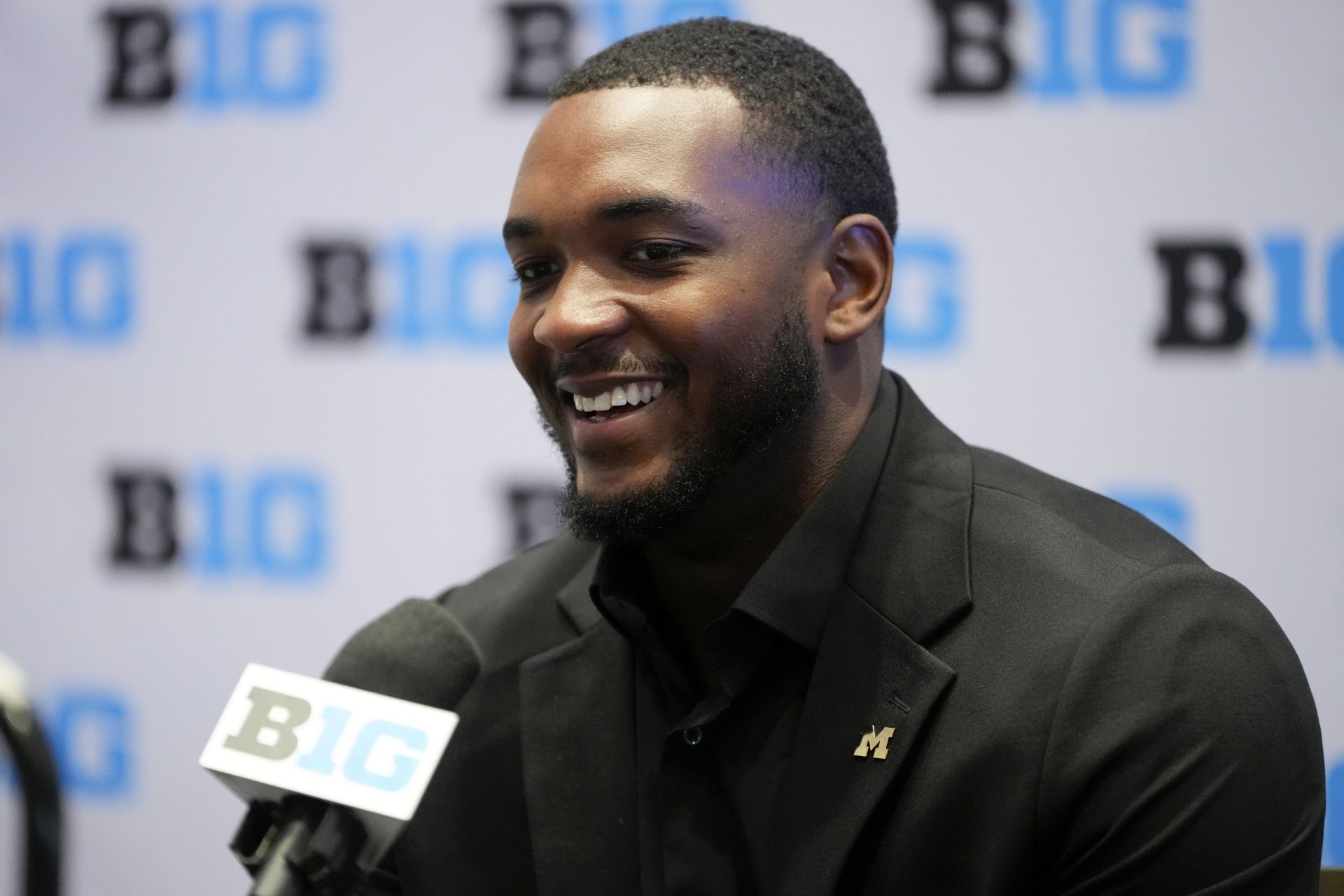 Michigan defensive end Derrick Moore speaks to the media during the Big Ten NCAA college football media days at Mandalay Bay Resort.