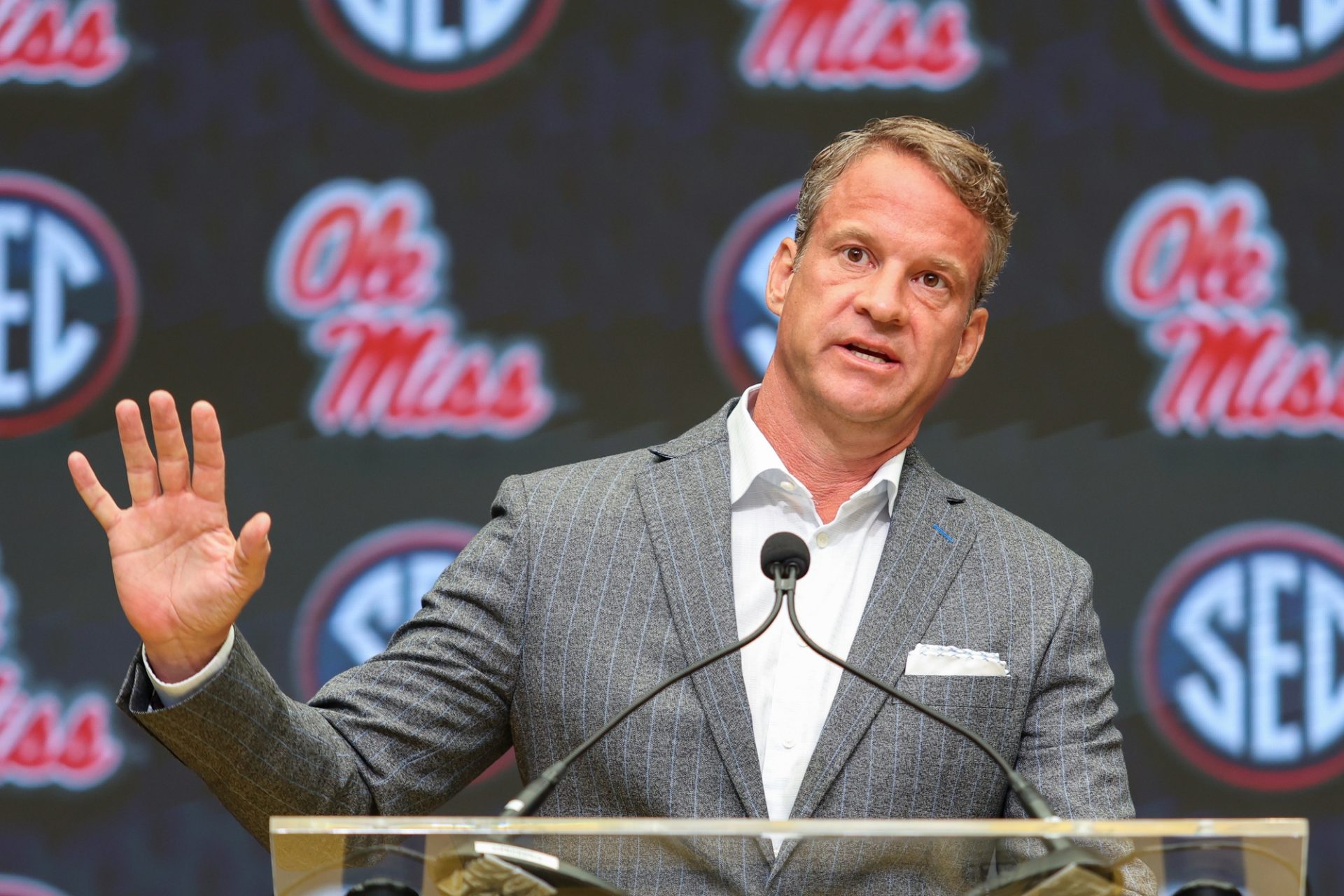 Ole Miss Rebels head coach Lane Kiffin speaks to the media during SEC Media Day at Omni Atlanta Hotel.