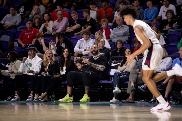 Carlos Boozer cheers for his sons, Cameron and Cayden, during their game against Myers Park in the City of Palms Classic on Monday, Dec. 19, 2022, at Suncoast Credit Union Arena in Fort Myers.

Fnp 121922 Ai Cop Boozer 1