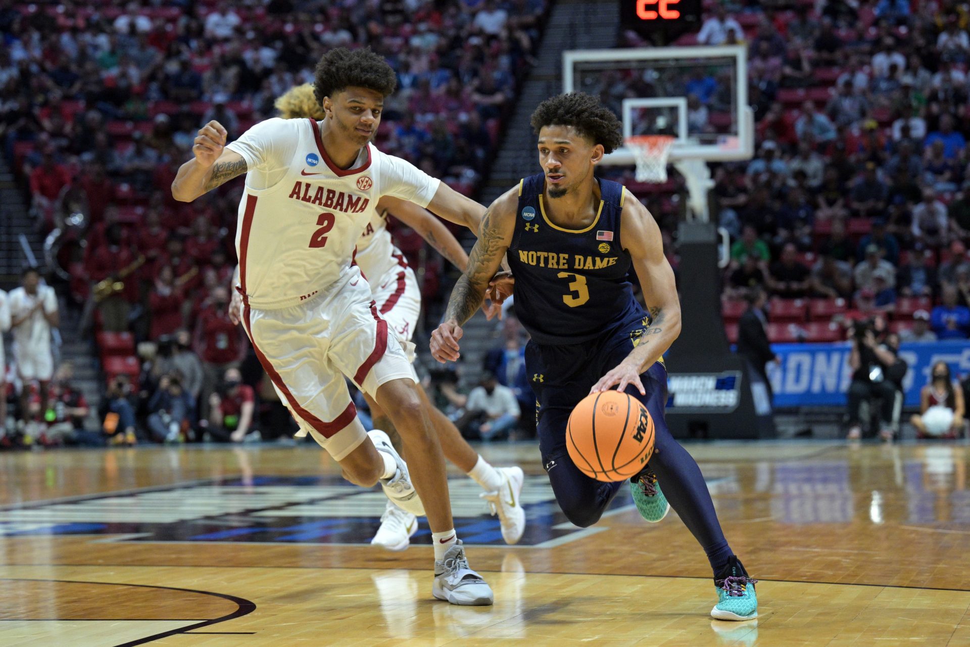 Notre Dame Fighting Irish guard Prentiss Hubb (3) controls the ball against Alabama Crimson Tide forward Darius Miles (2) in the second half during the first round of the 2022 NCAA Tournament at Viejas Arena.