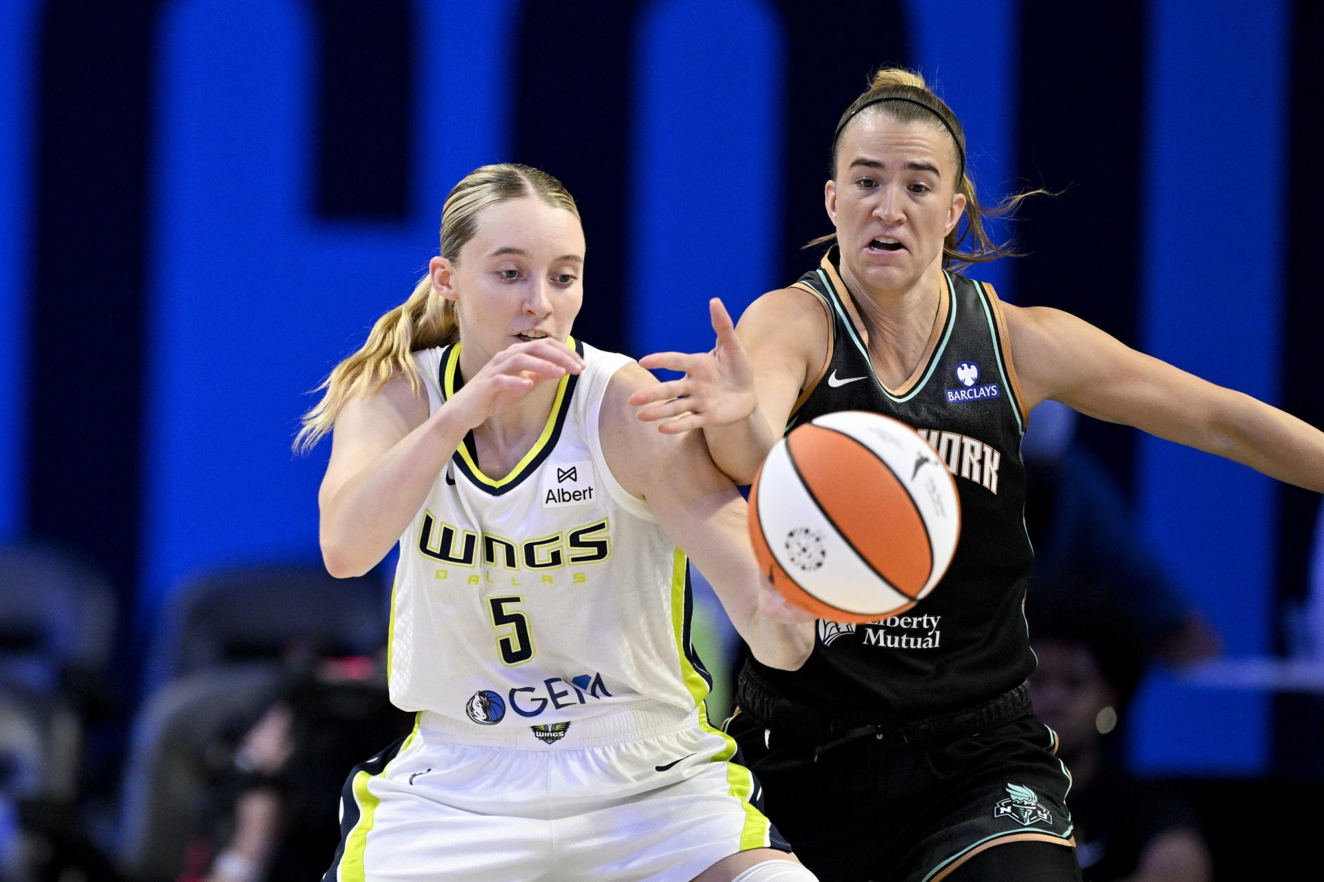 Dallas Wings guard Paige Bueckers (5) is fouled by New York Liberty guard Sabrina Ionescu (20) during the second half at College Park Center.