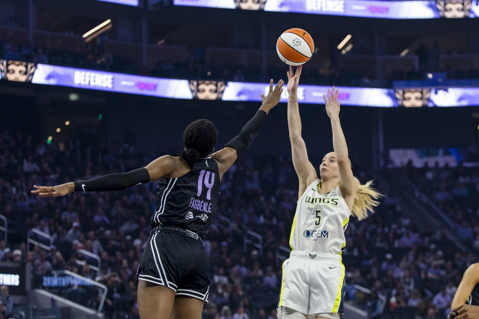 Dallas Wings guard Paige Bueckers (5) shoots against Golden State Valkyries center Temi Fagbenle (14) during the first quarter at Chase Center.