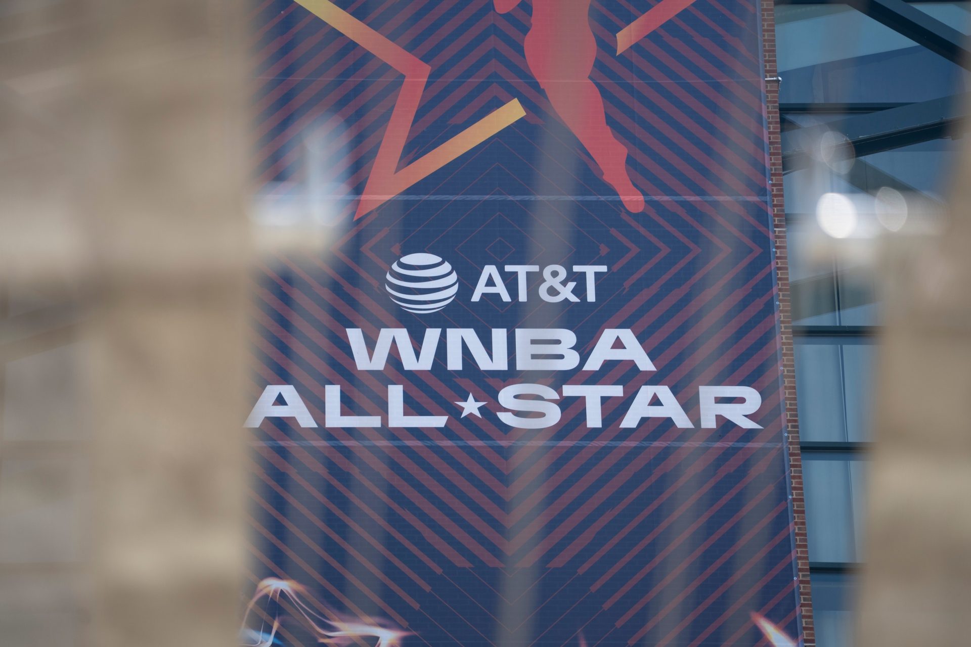Signs advertising the WNBA All-Star games go up around Gainbridge Fieldhouse, Tuesday, July 8, 2025, in Indianapolis.