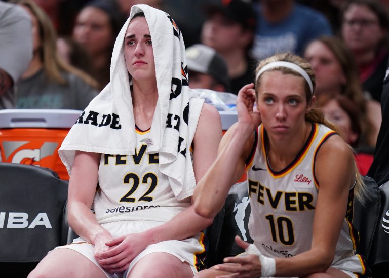 Indiana Fever guard Caitlin Clark (22) reacts on the bench after a play against the Connecticut Sun in the second half at TD Garden.