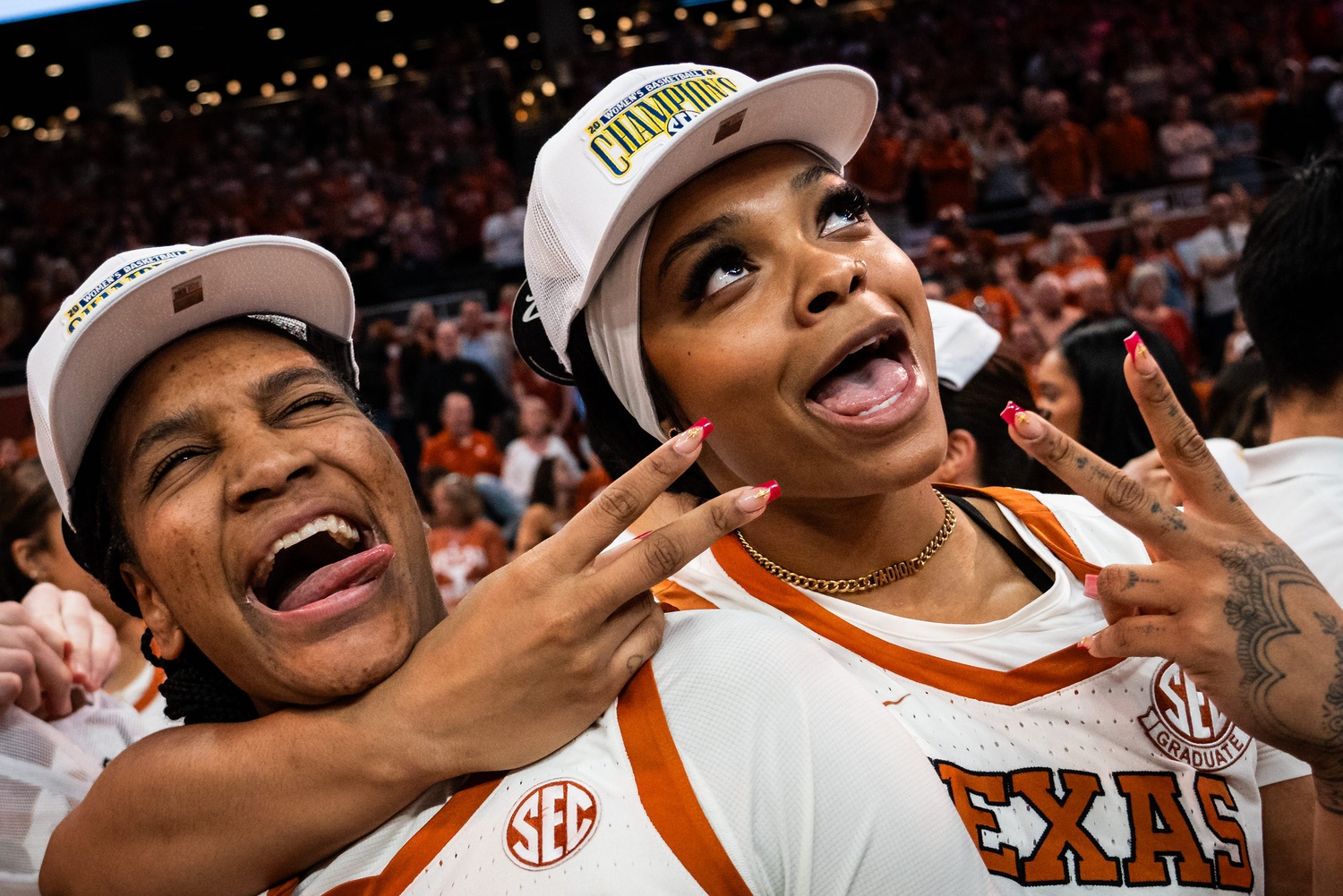 Texas Longhorns forwards Madison Booker (35) and Aaliyah Moore (23) regular season SEC Championship after beating Florida at home in the Moody Center, March 2, 2025.