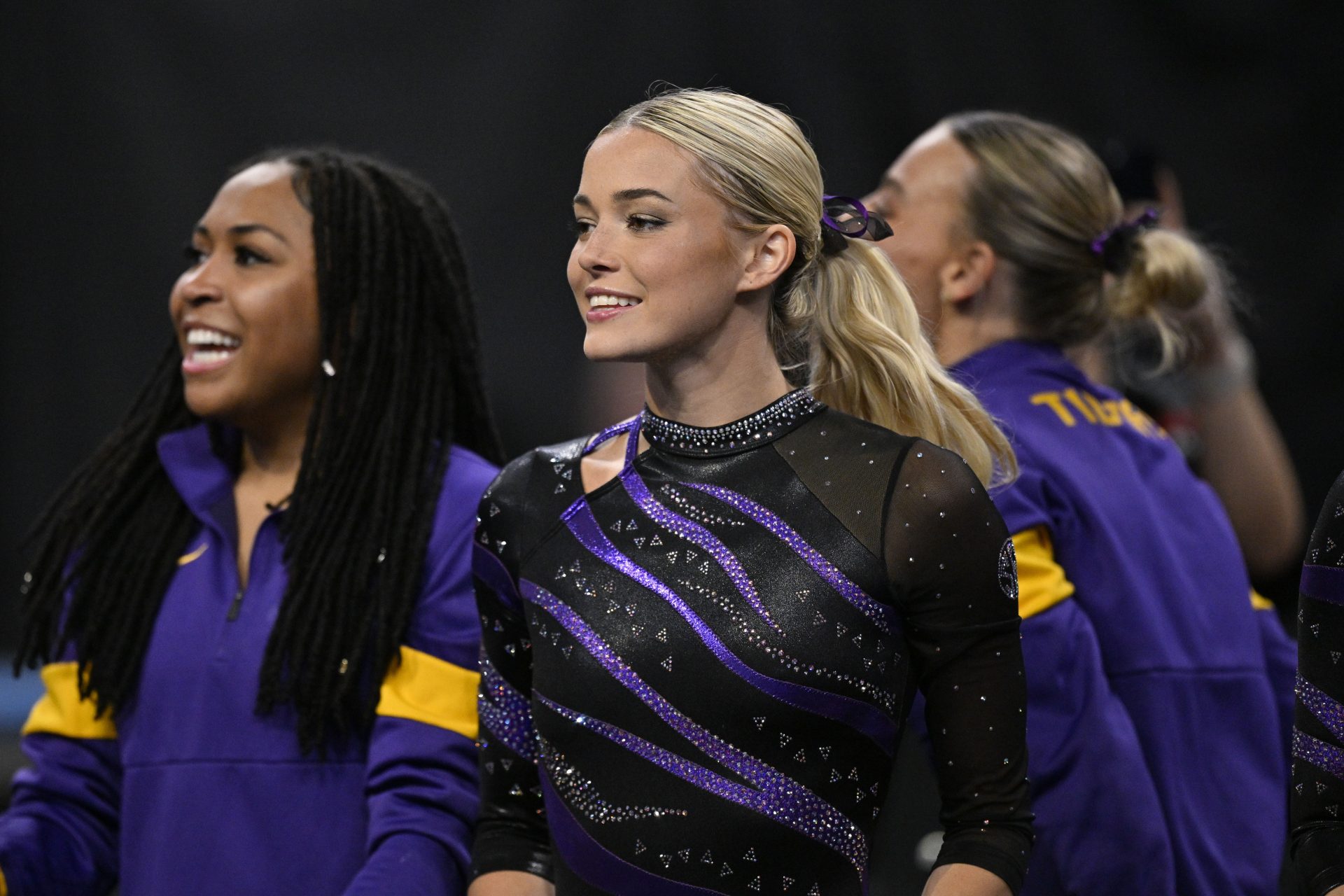 LSU Tigers gymnast Olivia Dunne cheers for the LSU gymnastic team during the 2025 Women's National Gymnastics Semifinal at Dickies Arena.