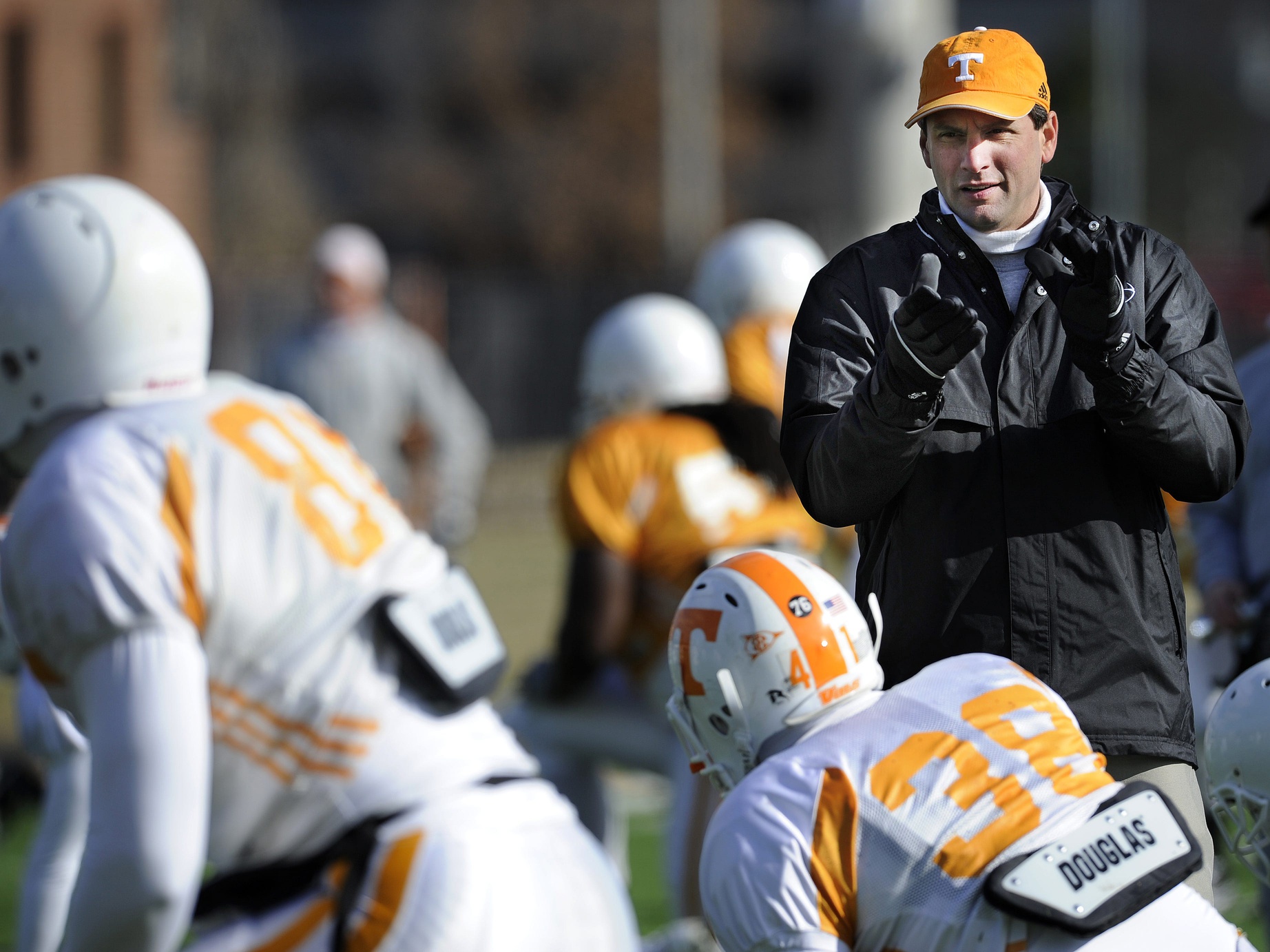 Tennessee head coach Derek Dooley watches his team warm-up during practice at the Vanderbilt University practice field in preparation for the Music City Bowl in Nashville Dec. 27, 2010.

These Vols Feel Right At Home