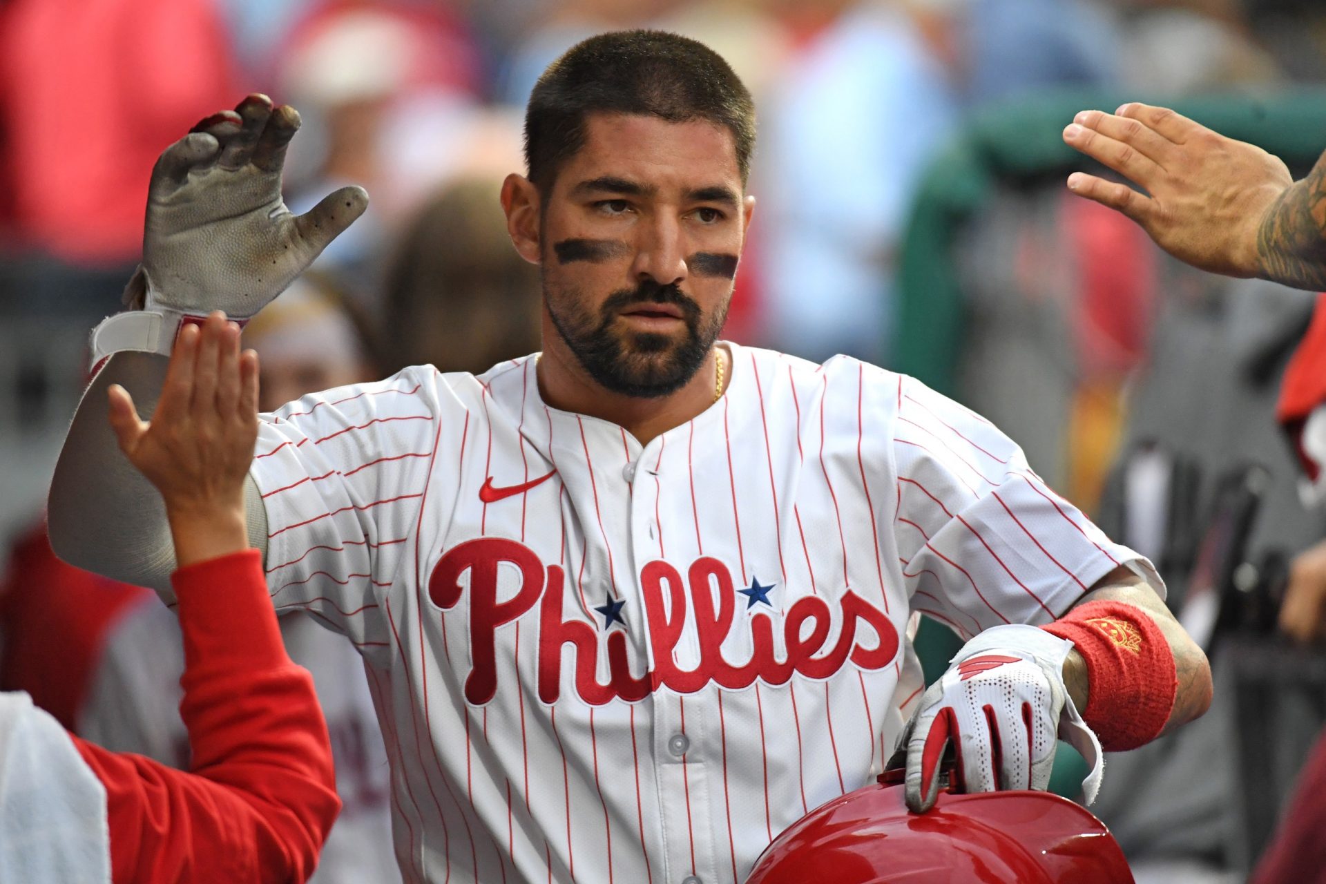 Philadelphia Phillies outfielder Nick Castellanos (8) celebrates in the dugout after scoring a run during the second inning against the Seattle Mariners at Citizens Bank Park.