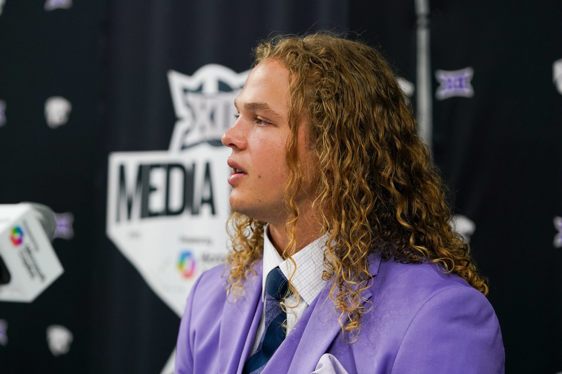 Kansas State quarterback Avery Johnson answers questions from the media during 2025 Big 12 Football Media Days at The Star.
