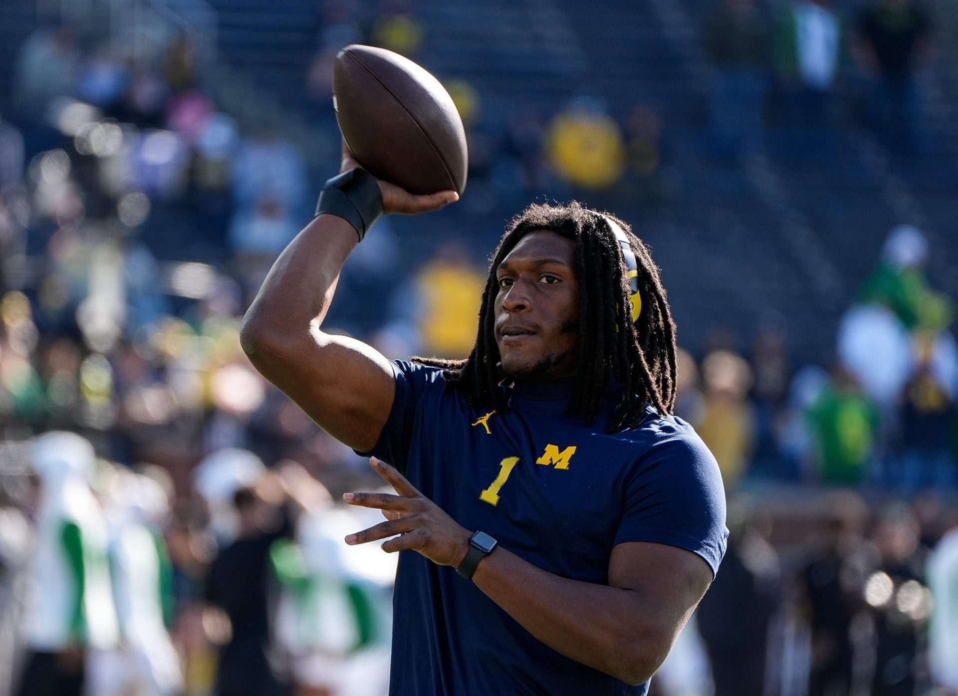Michigan linebacker Jaishawn Barham (1) warms up before the Oregon game at Michigan Stadium in Ann Arbor on Saturday, Nov. 2, 2024.