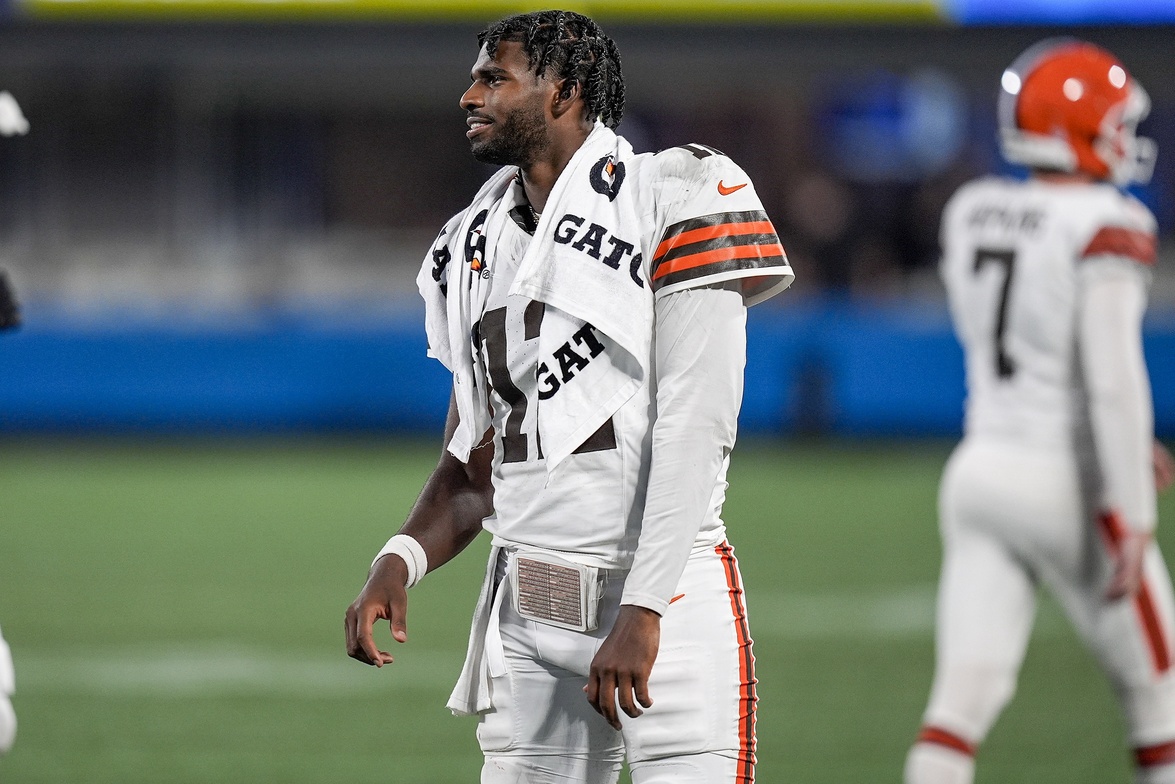 Cleveland Browns quarterback Shedeur Sanders (12) greets teammates coming off the field after a touchdown drive against the Carolina Panthers during the second half at Bank of America Stadium.