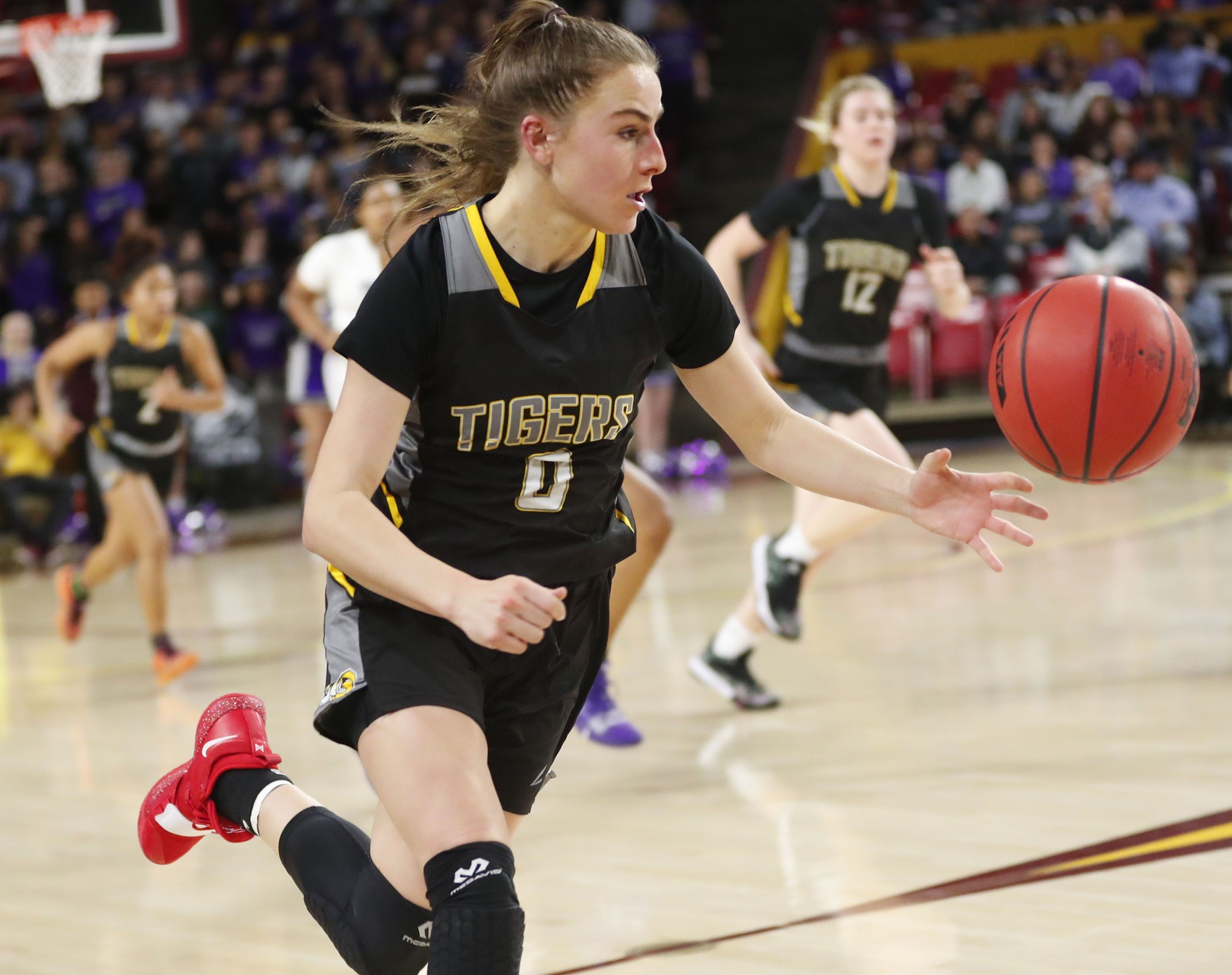Gilbert's Hanna Cavinder (0) tracks down a loose ball against Millennium during the Girls State 5A Championship game in Tempe, Ariz. Feb. 25, 2019.

Girls State 5a Championship