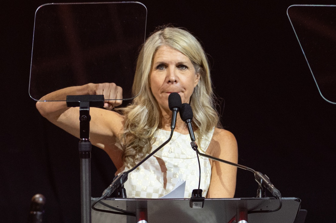 Mary Kay Cabot, the 57th Bill Nunn Memorial award honoree, speaks to the audience at the 2025 Pro Football Hall of Fame Enshrinees’ Gold Jacket Dinner at Canton Memorial Civic Center.