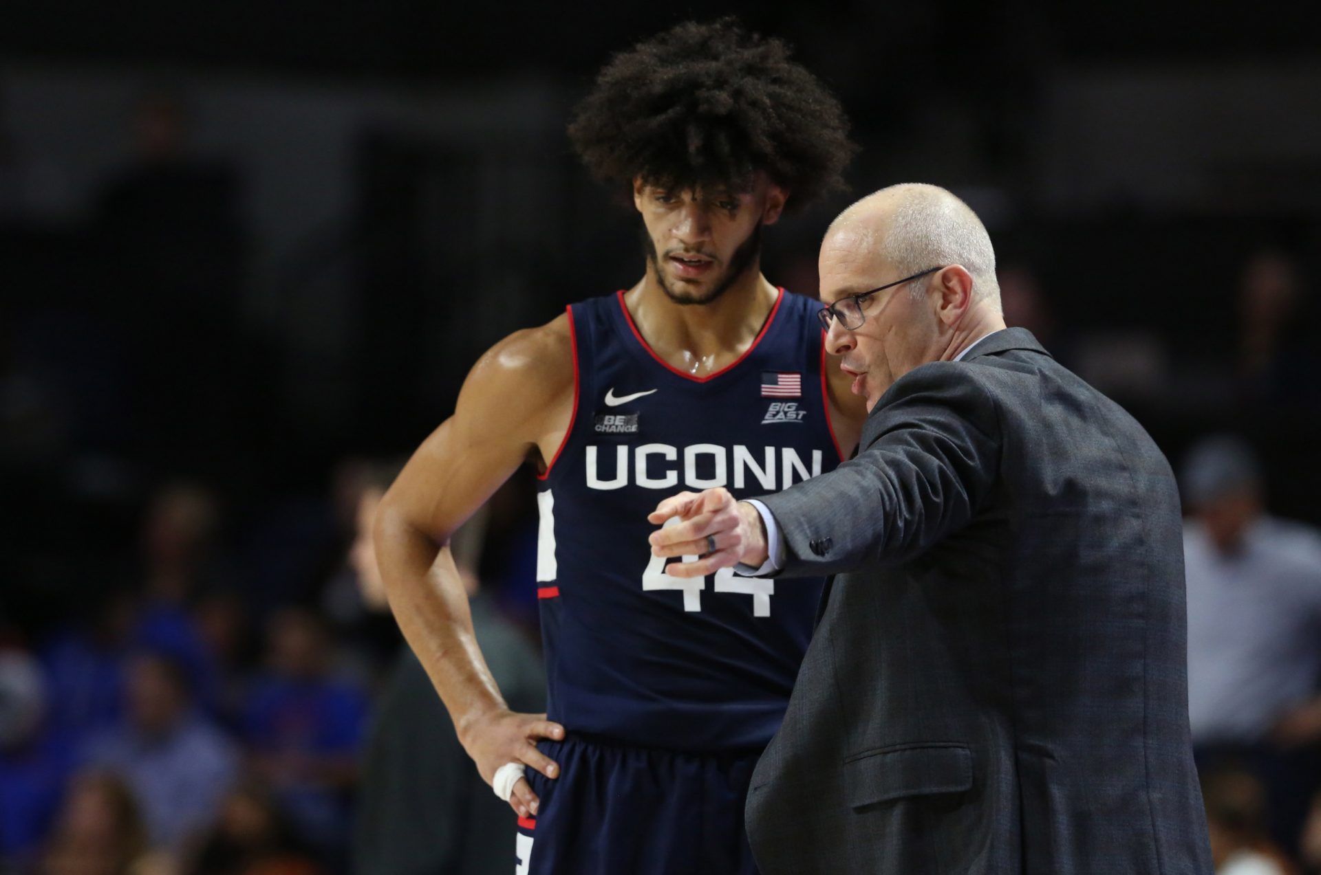 Connecticut Huskies head coach Dan Hurley talks with guard Andre Jackson Jr. (44) during the second half at Exactech Arena at the Stephen C. O'Connell Center.
