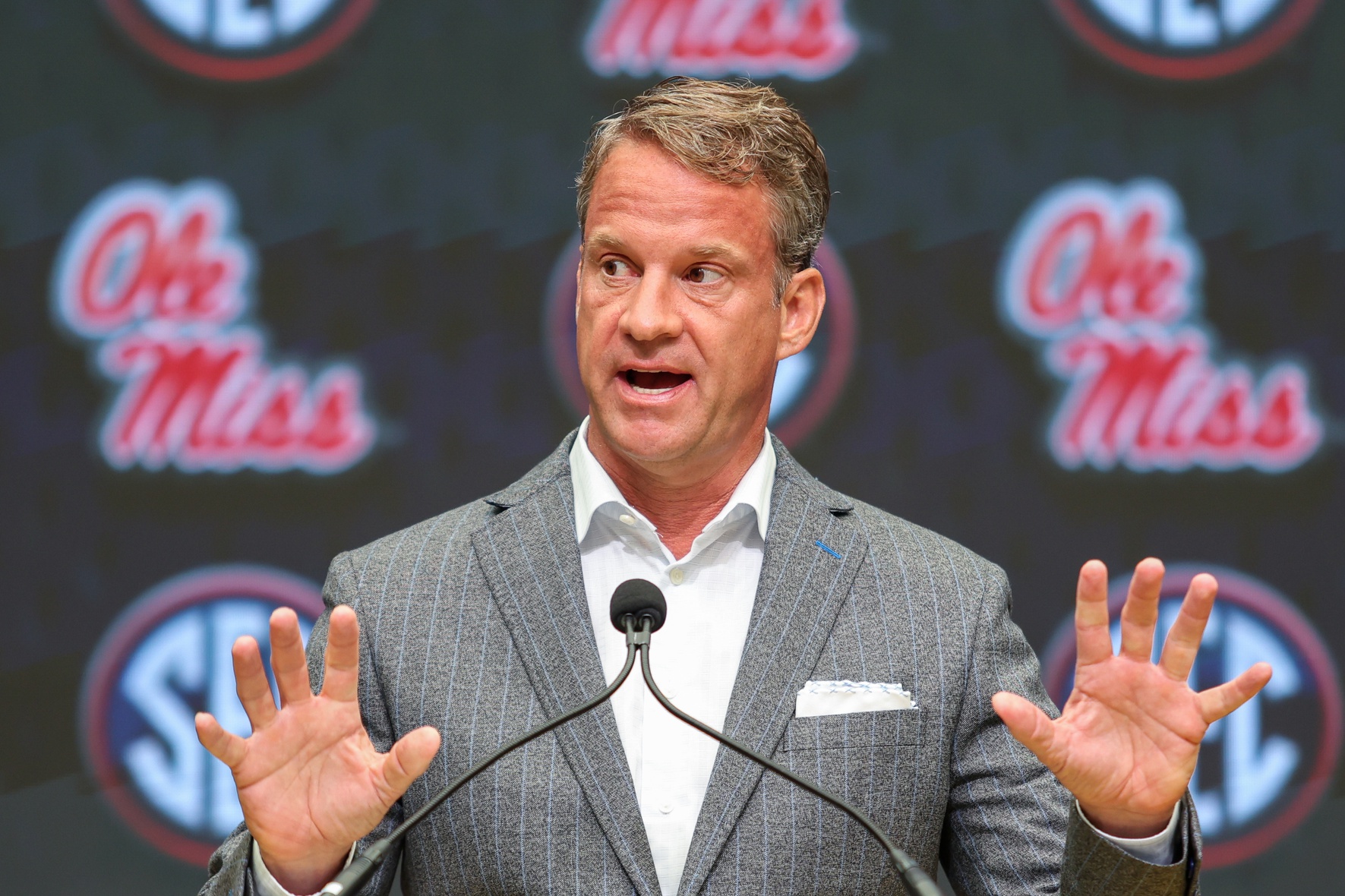 Ole Miss Rebels head coach Lane Kiffin speaks to the media during SEC Media Day at Omni Atlanta Hotel.