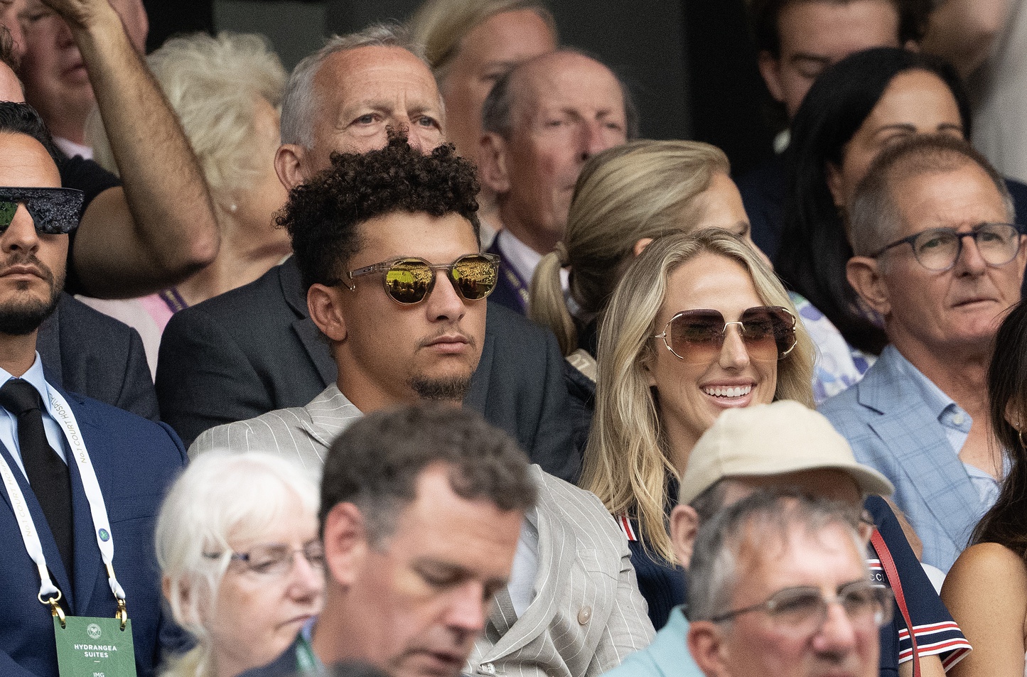 Kansas City Chiefs quarterback Patrick Mahomes and wife Brittany Mahomes in attendance for the Carlos Alcaraz of Spain and Frances Tiafoe of the United States (both not shown) match on day five of The Championships at All England Lawn Tennis and Croquet Club.