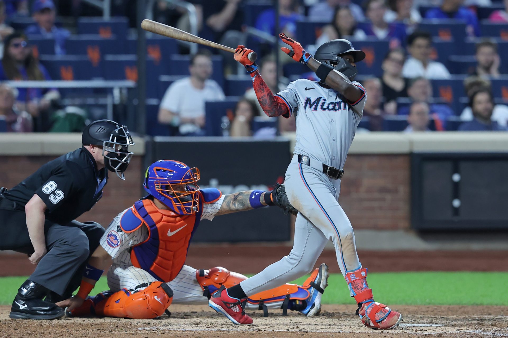 Miami Marlins center fielder Jazz Chisolm Jr. (2) follows through on an RBI single against the New York Mets during the fifth inning at Citi Field.