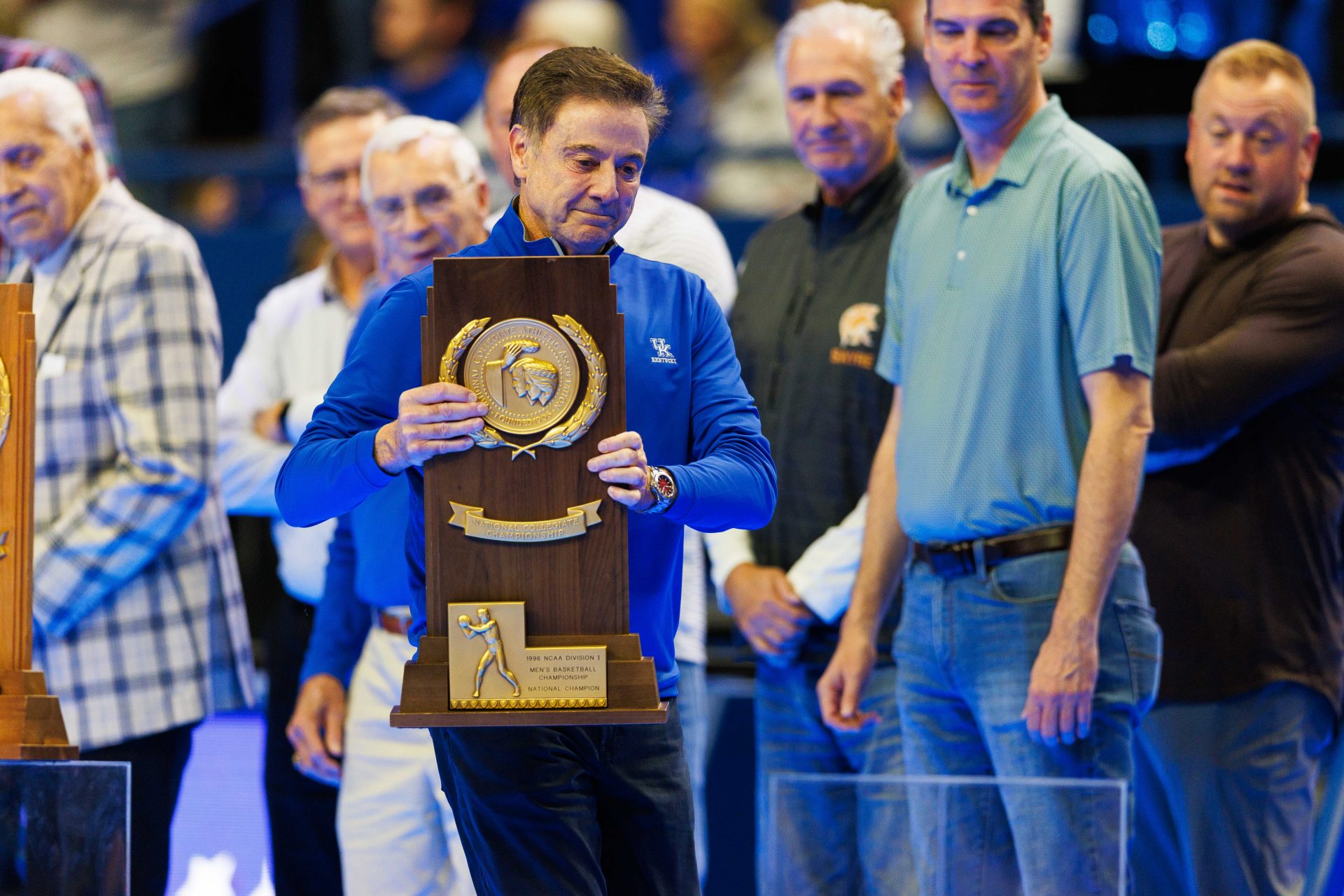 Former Kentucky Wildcats head coach and current St. John's head coach Rick Pitino brings out the 1996 NCAA Division I National Championship trophy during Big Blue Madness at Rupp Arena at Central Bank Center.