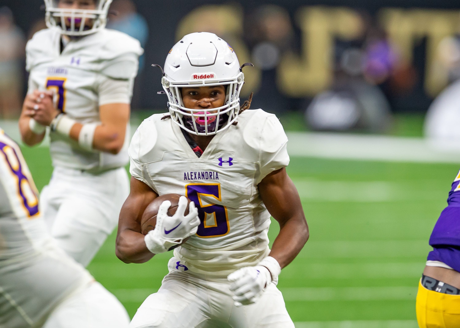 Jt Lindsey 6 runs the ball as Alexandria takes on Edna Karr in the LHSAA Div I State Football Championship game in the Caesars Superdome in New Orleans, LA. Saturday, Dec. 14, 2024.