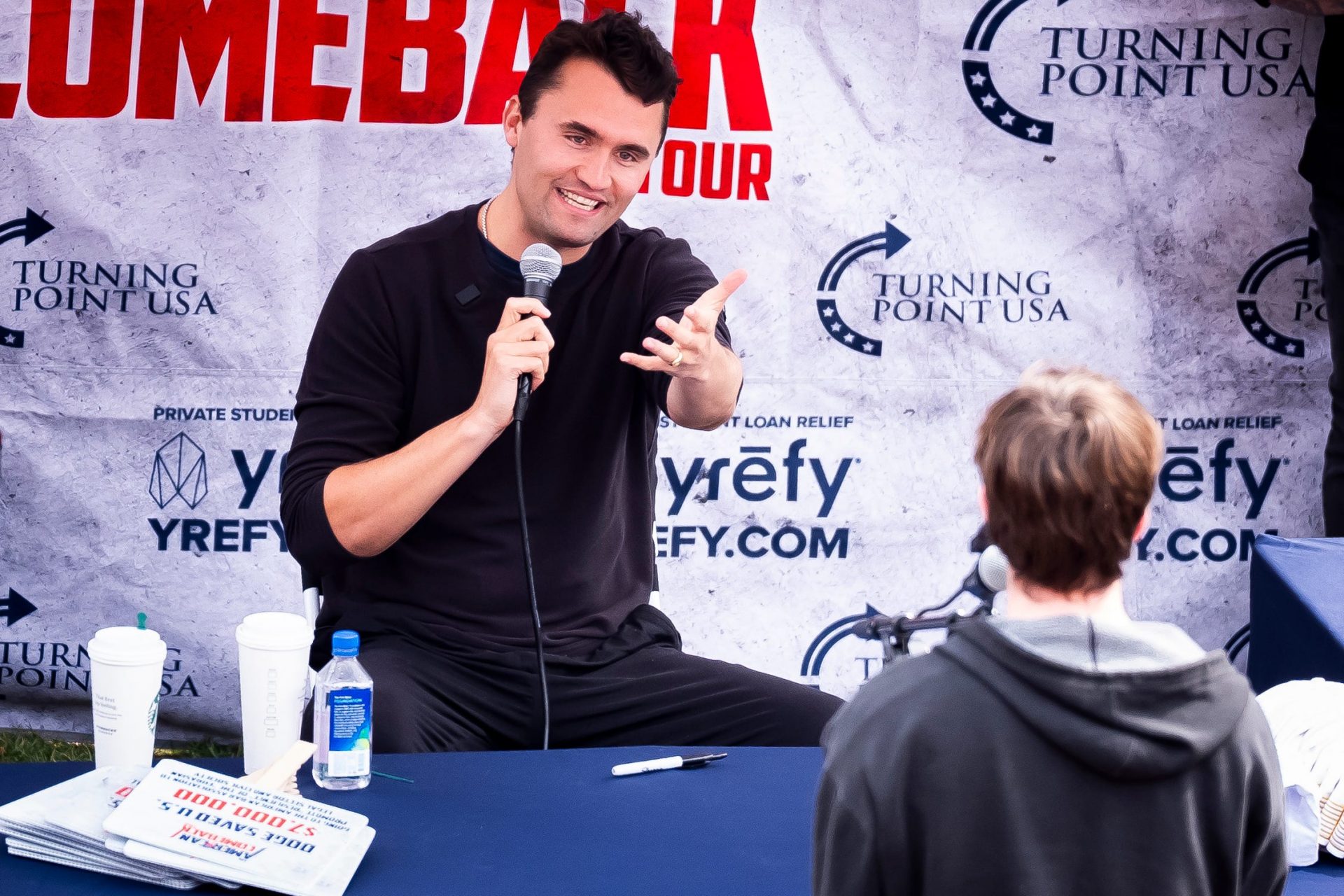 Turning Point USA founder and CEO Charlie Kirk debates students during his American Comeback Tour event held at the Humanities Amphitheatre on the University of Tennessee's campus in Knoxville on Thursday, March 13, 2025.