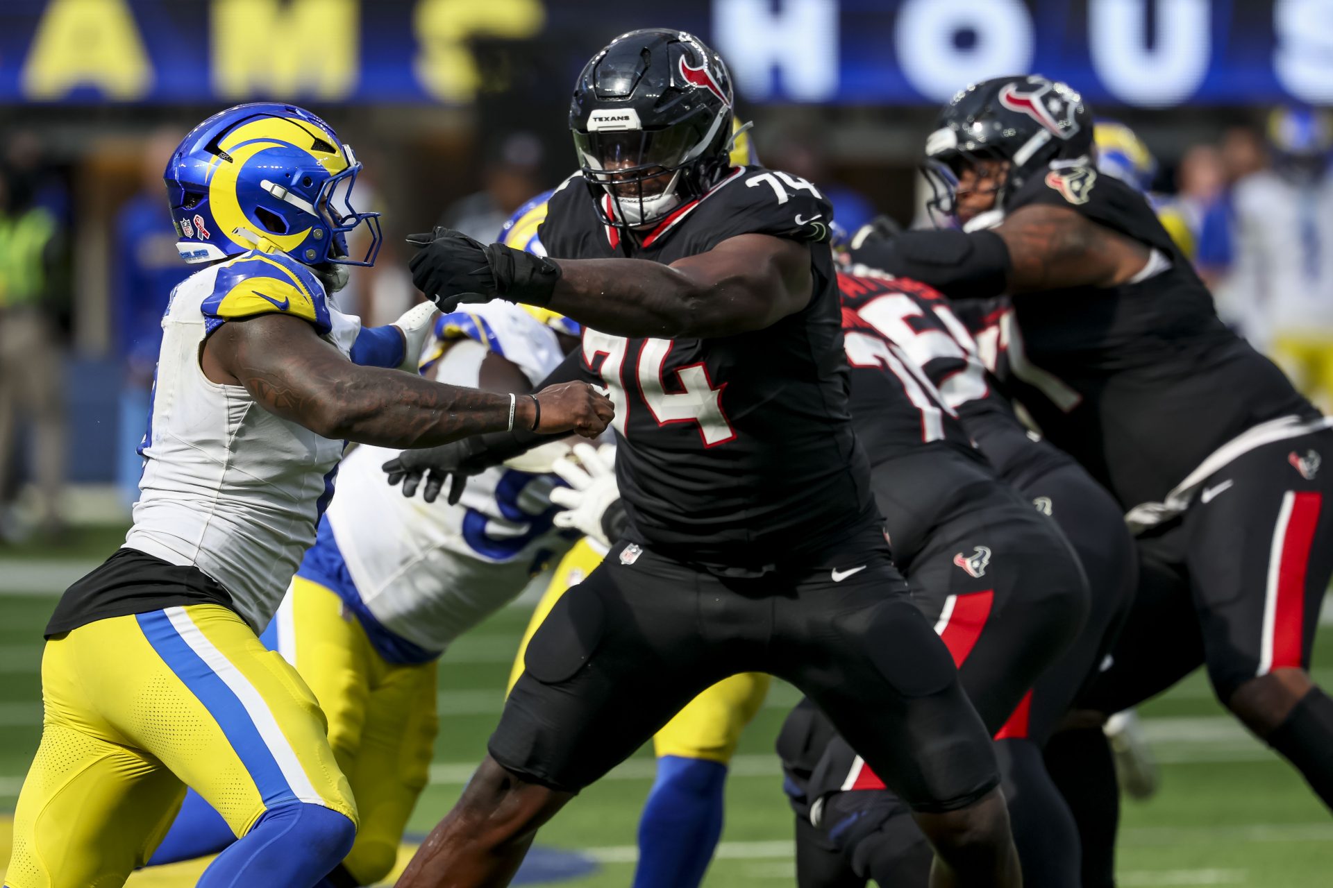 Houston Texans offensive tackle Cam Robinson (74) blocks during the fourth quarter at SoFi Stadium.
