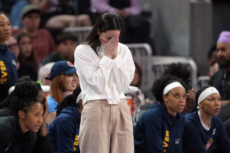 Indiana Fever guard Caitlin Clark (center) reacts during the third quarter against the Golden State Valkyries at Chase Center.