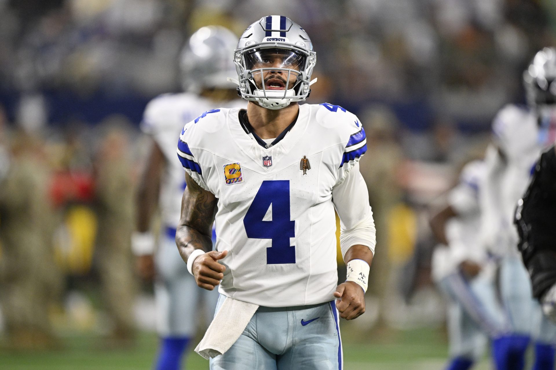 Dallas Cowboys quarterback Dak Prescott (4) looks on before the game against the Green Bay Packers at AT&T Stadium.