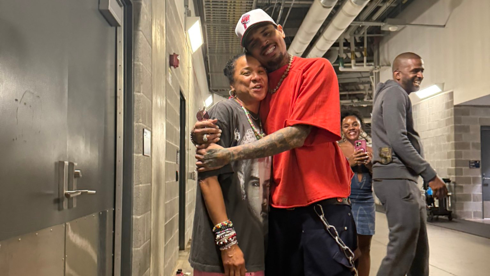 Dawn Staley and Chris Brown. - Source: @dawnstaley on X