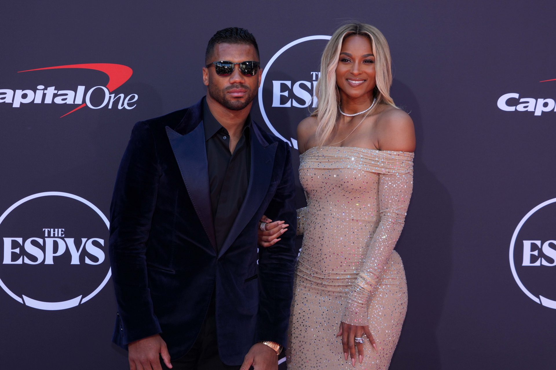 Russell Wilson (left) and wife Ciara pose on the ESPYs red carpet at the Dolby Theatre.