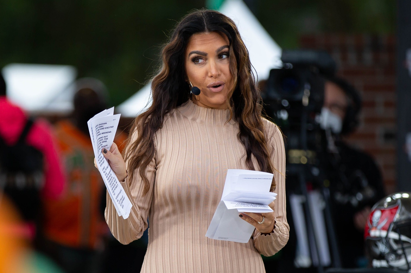 Sports commentator Molly Qerim Rose speaks to the crowd during a live taping of ESPN's 