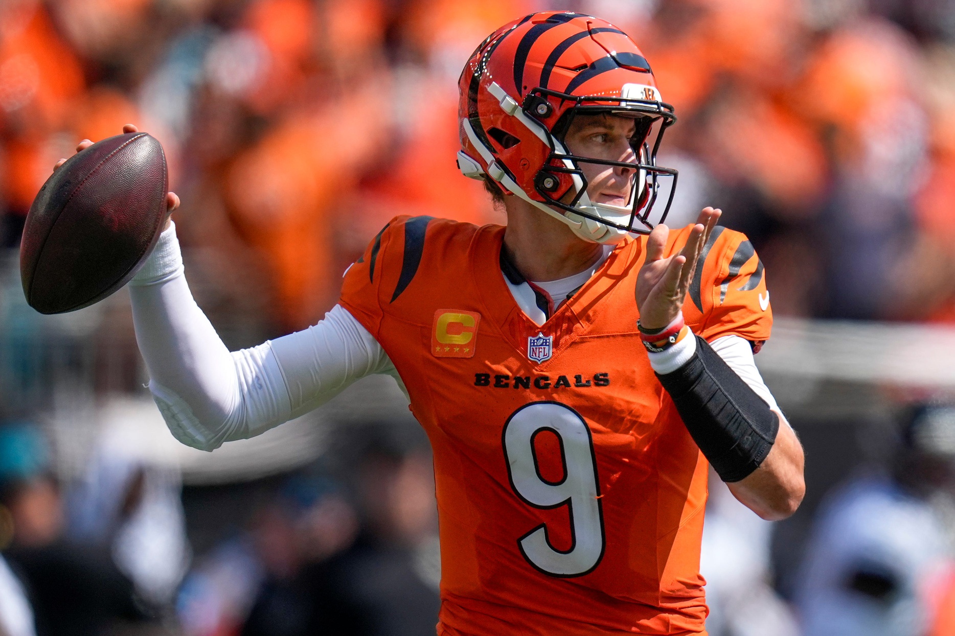 Cincinnati Bengals quarterback Joe Burrow (9) throws a pass in the first quarter of the NFL Week 2 game between the Cincinnati Bengals and the Jacksonville Jaguars at Paycor Stadium in downtown Cincinnati on Sunday, Sept. 14, 2025. The Jaguars led 17-10 at halftime.