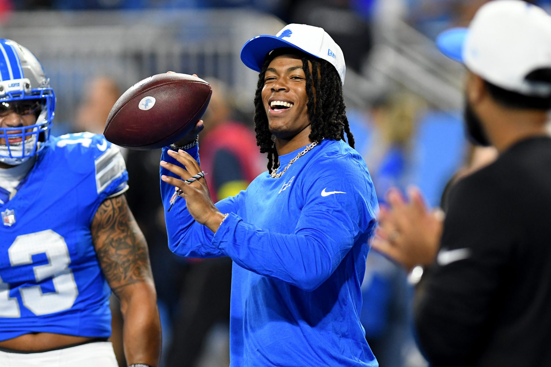 Detroit Lions running back Jahmyr Gibbs (0) laughs with teammates before their game against the Houston Texans at Ford Field.