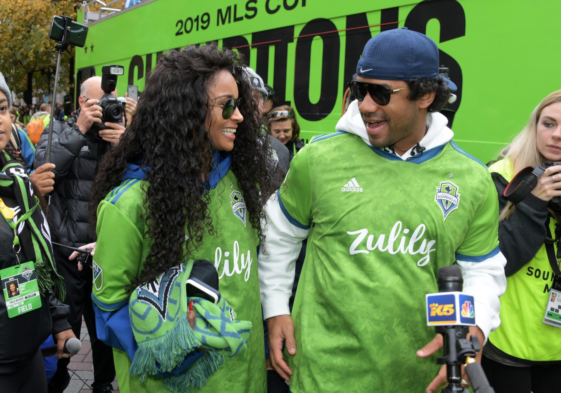 Seattle Sounders owners Russell Wilson (right) and wife Ciara attend the MLS Cup Champions parade.