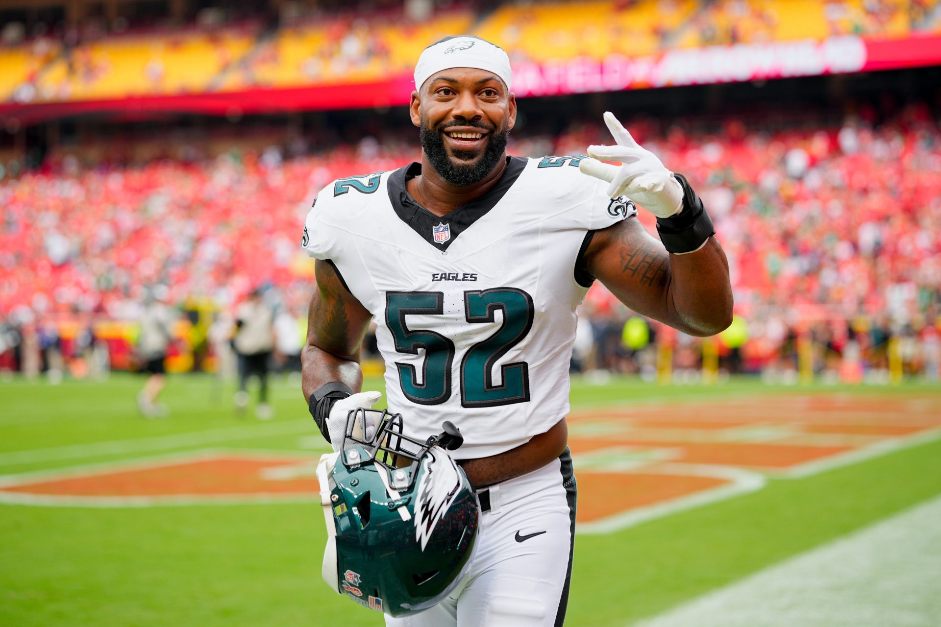 Philadelphia Eagles defensive end Za'Darius Smith (52) guestures to fans prior to the game against the Kansas City Chiefs at GEHA Field at Arrowhead Stadium.