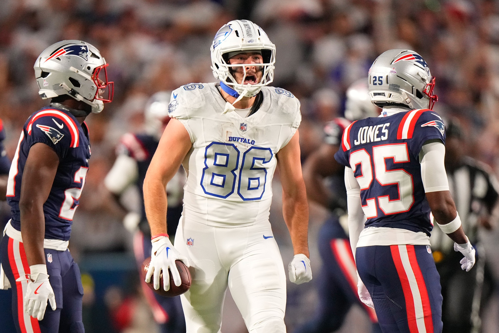 Buffalo Bills tight end Dalton Kincaid (86) reacts to making a catch against the New England Patriots during the first half at Highmark Stadium.