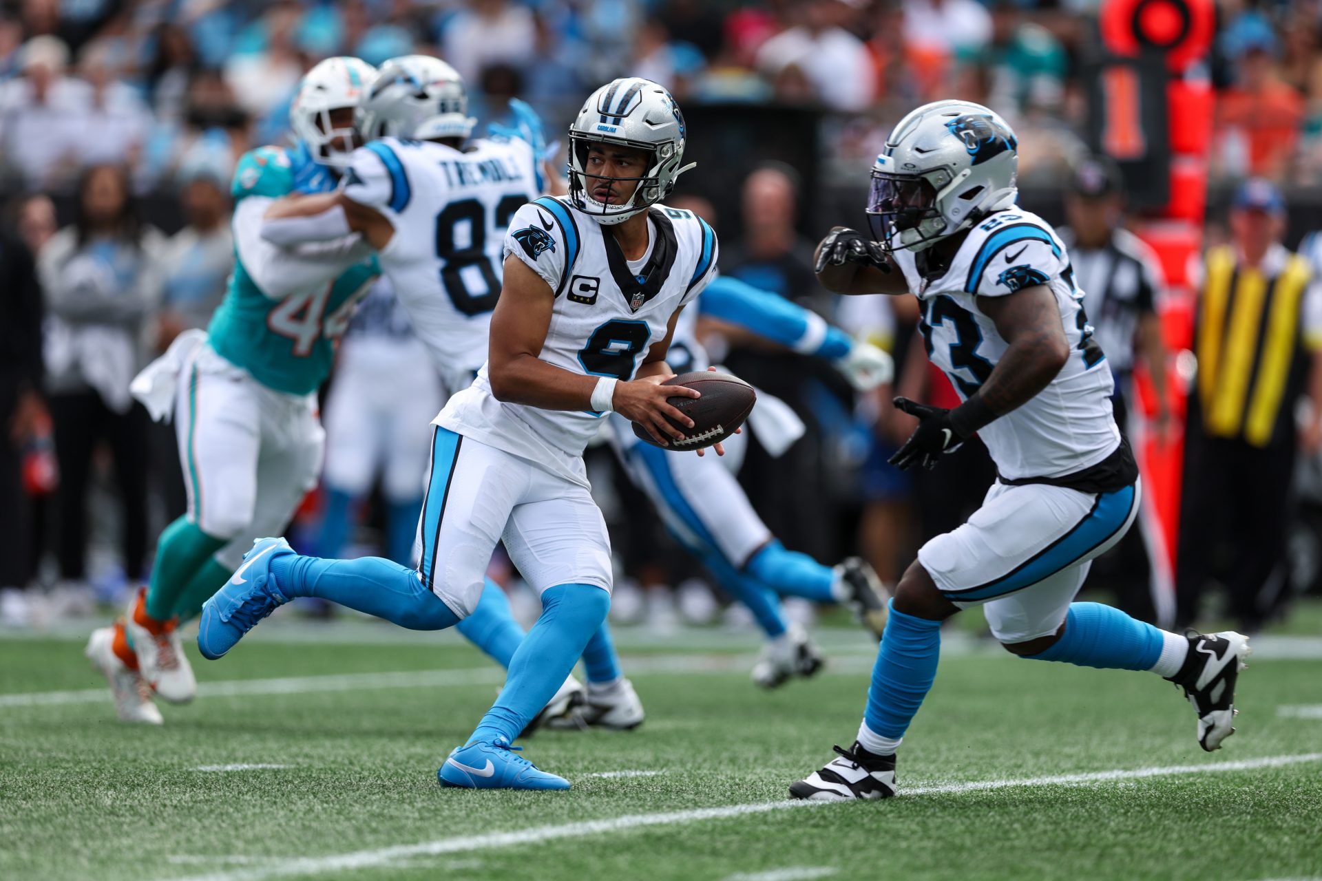 Carolina Panthers quarterback Bryce Young (9) fakes a hand off during the fourth quarter against the Miami Dolphins at Bank of America Stadium.