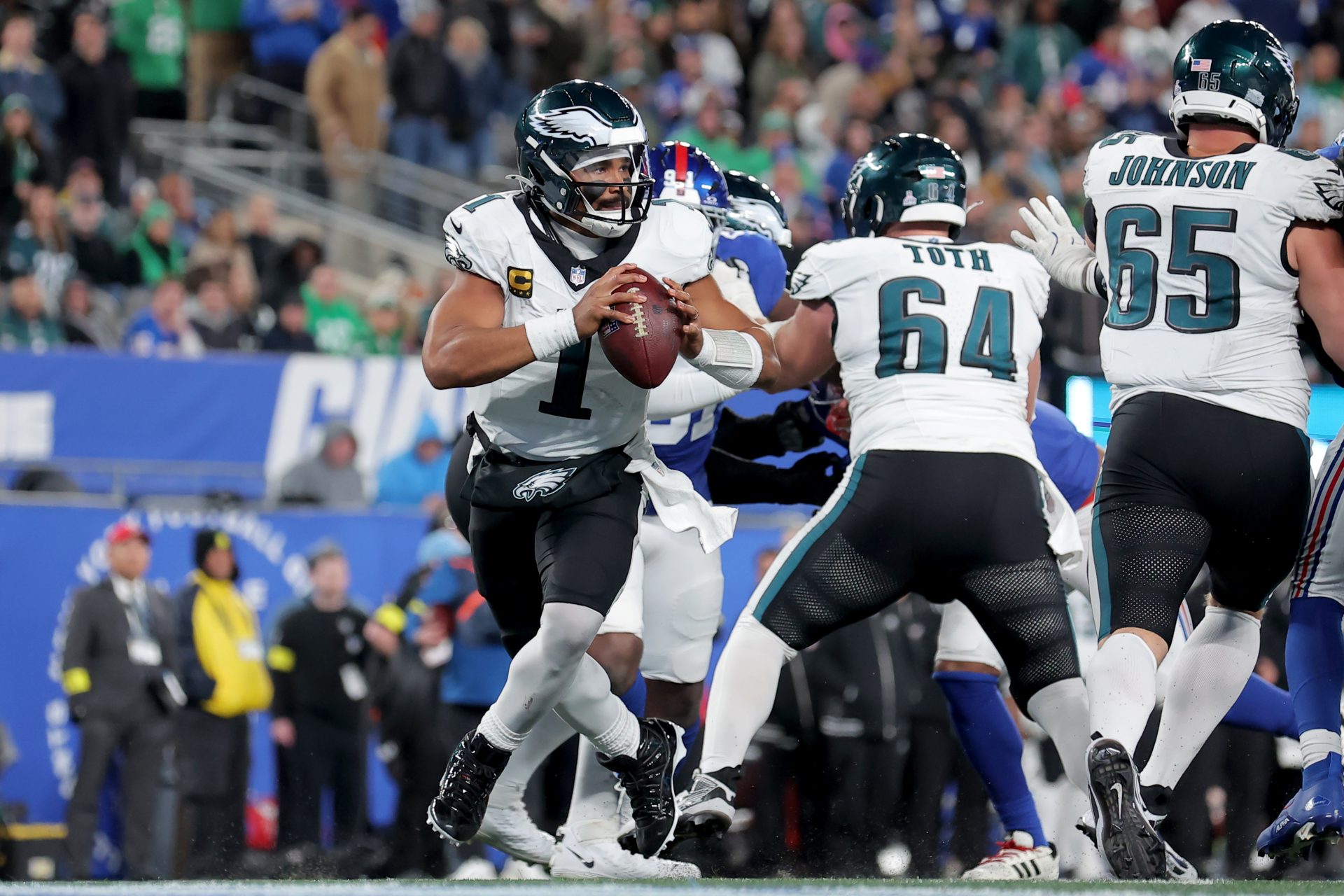 Philadelphia Eagles quarterback Jalen Hurts (1) looks to pass against the New York Giants during the fourth quarter at MetLife Stadium.