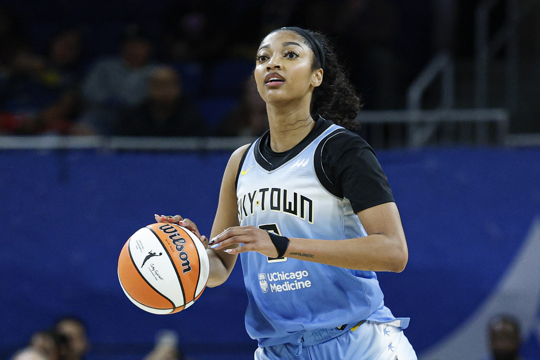 Chicago Sky forward Angel Reese (5) brings the ball up court against the Connecticut Sun during the second half at Wintrust Arena.
