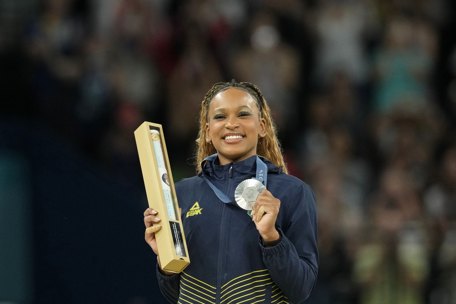 Rebeca Andrade of Brazil celebrates her silver medal on the vault on the first day of gymnastics event finals during the Paris 2024 Olympic Summer Games at Bercy Arena.