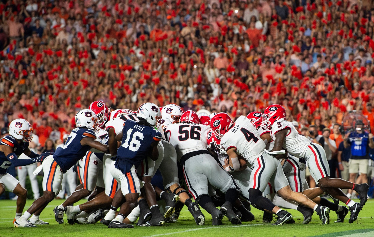 Auburn Tigers quarterback Jackson Arnold (11) attempts a goal line push which is eventually ruled a fumble recovered by Georgia as Auburn Tigers take on Georgia Bulldogs at Jordan-Hare Stadium in Auburn, Ala. on Saturday, Oct. 11, 2025. Auburn Tigers lead Georgia Bulldogs 10-3 at halftime.