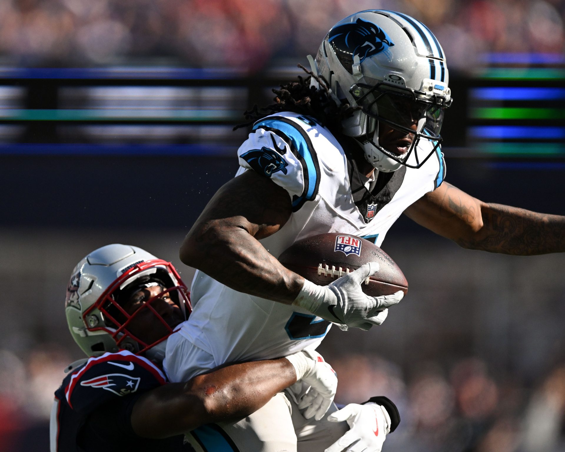 Carolina Panthers running back Rico Dowdle (5) runs against the New England Patriots during the second half at Gillette Stadium.