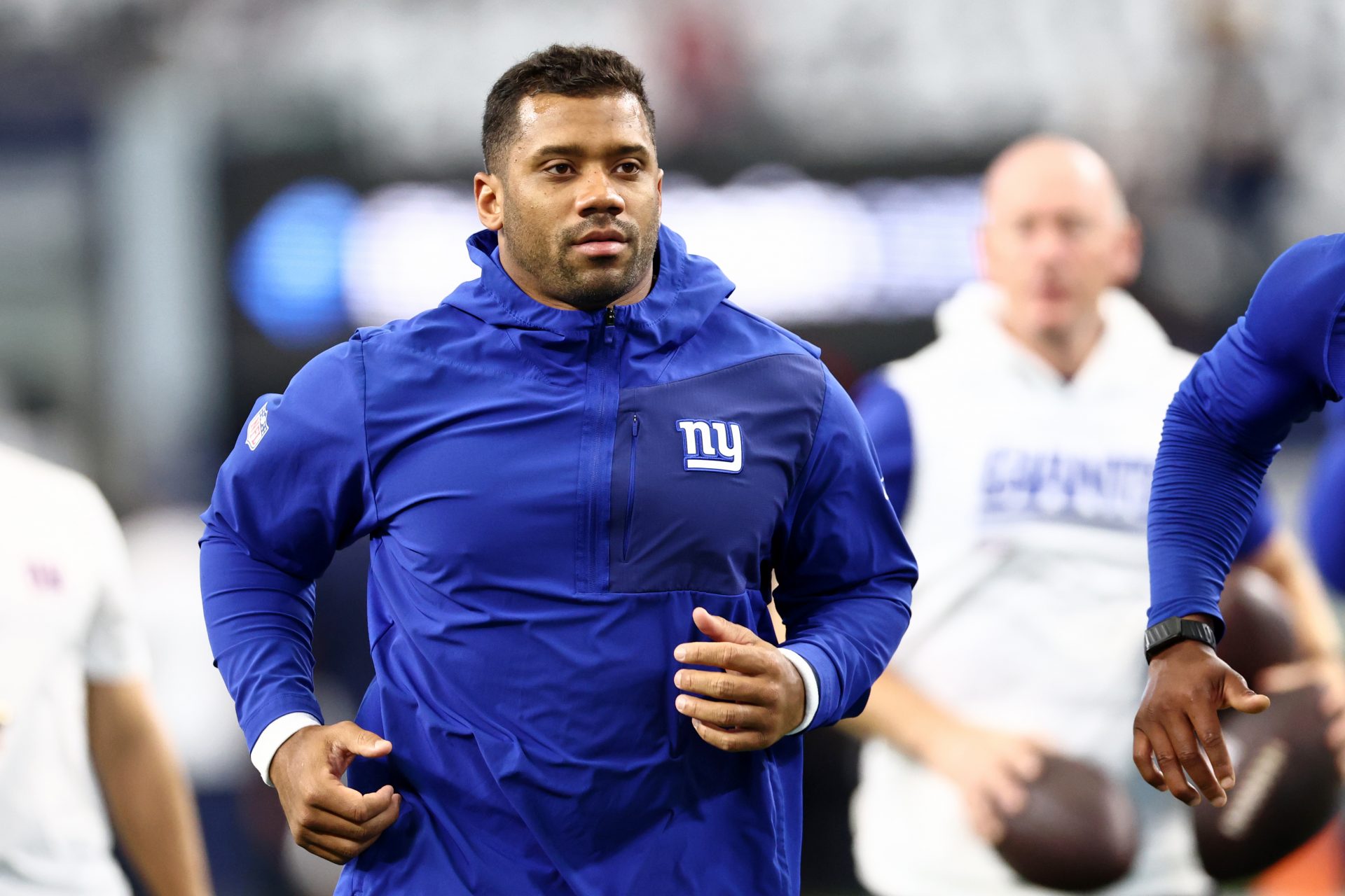 New York Giants quarterback Russell Wilson (3) warms up before the game against the Dallas Cowboys at AT&T Stadium.